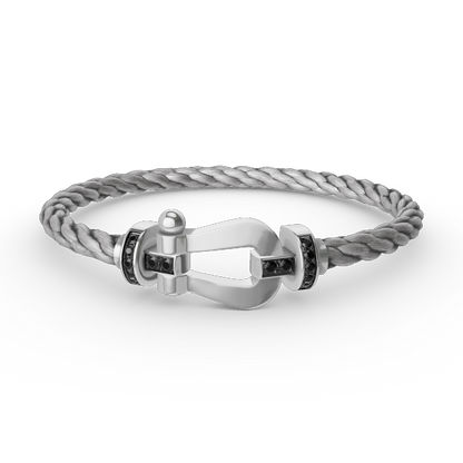 [Aetheris]FORCE GROSSES HUFEISEN-ARMBAND MIT SCHWARZER DIAMANTENVERZIERUNG - WEISSGOLD